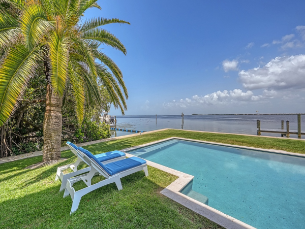 Bayfront Luxury Vacation Rental in Holmes Beach with Private Dock, Pool & Spa