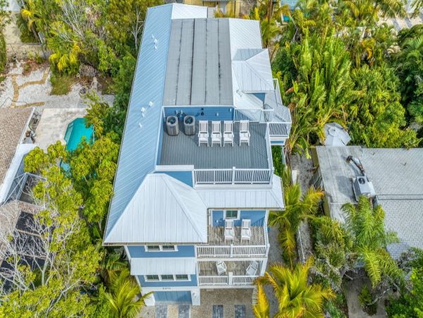 Bradenton Beach Vacation Rental Luxury 7-Bedroom Anna Maria Island Home with Pool & Rooftop Deck