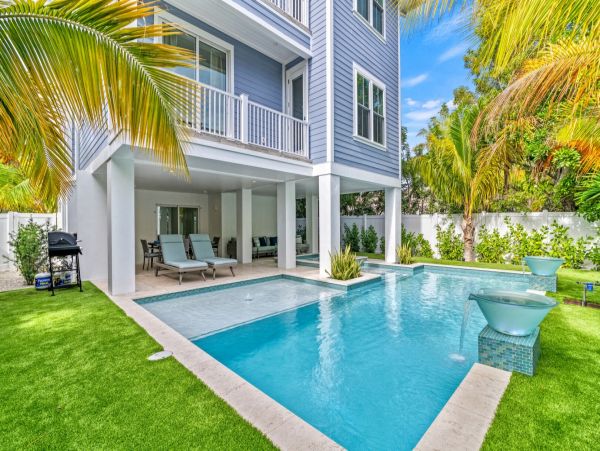 Bradenton Beach Vacation Rental Luxury 7-Bedroom Anna Maria Island Home with Pool & Rooftop Deck