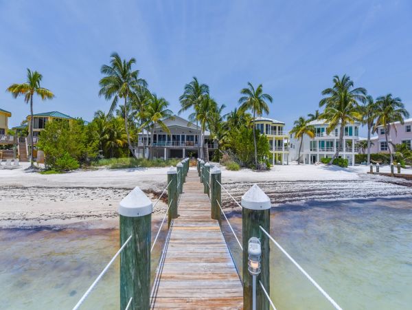 Marathon Beach Oceanfront Vacation Rental | Luxury 6-Bedroom Estate with Dock Beachfront