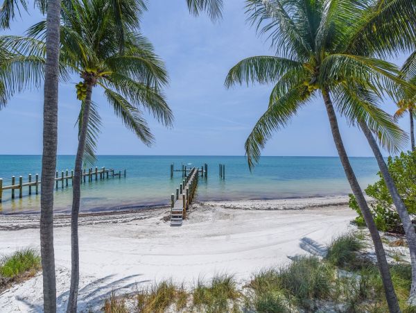 Marathon Beach Oceanfront Vacation Rental | Luxury 6-Bedroom Estate with Dock Beachfront