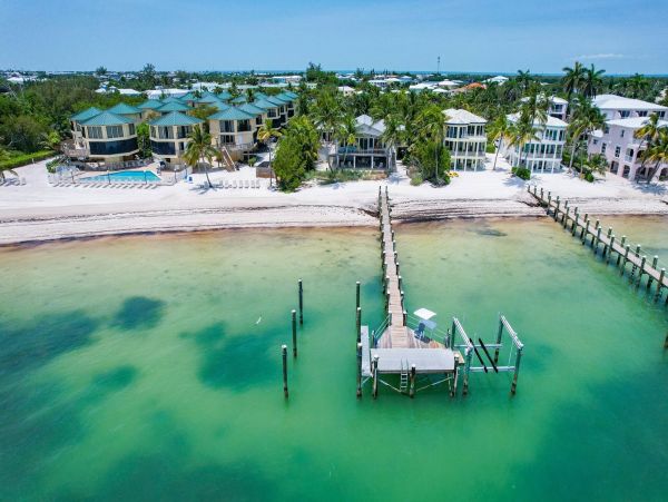 Marathon Beach Oceanfront Vacation Rental | Luxury 6-Bedroom Estate with Dock Beachfront