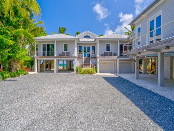 Marathon Beach Oceanfront Vacation Rental | Luxury 6-Bedroom Estate with Dock Beachfront