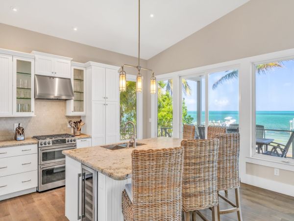 Marathon Beach Oceanfront Vacation Rental | Luxury 6-Bedroom Estate with Dock Beachfront