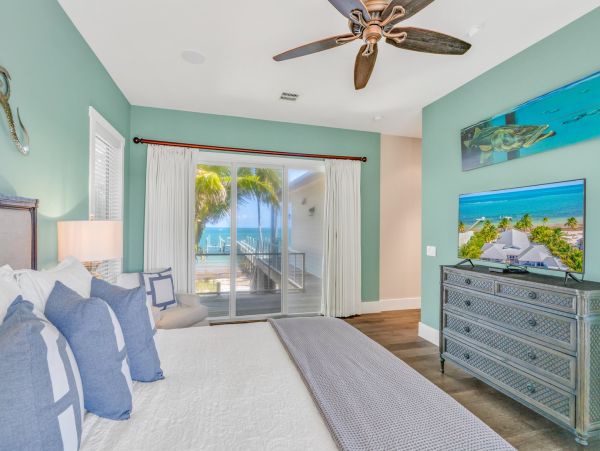 Marathon Beach Oceanfront Vacation Rental | Luxury 6-Bedroom Estate with Dock Beachfront