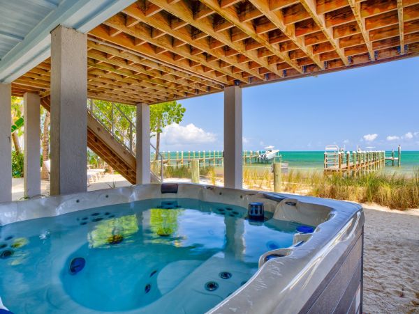 Marathon Beach Oceanfront Vacation Rental | Luxury 6-Bedroom Estate with Dock Beachfront