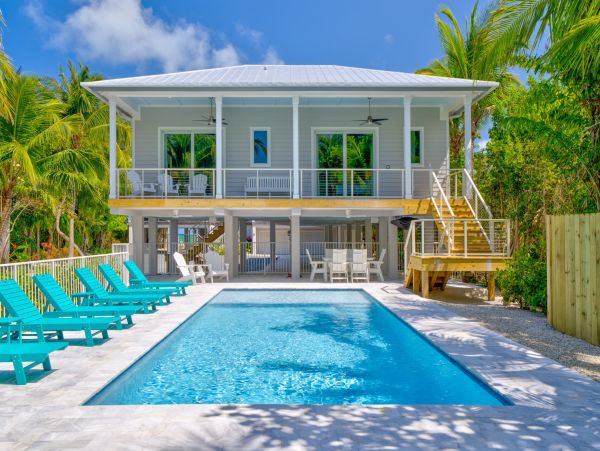 Marathon Beach Oceanfront Vacation Rental | Luxury 6-Bedroom Estate with Dock Beachfront