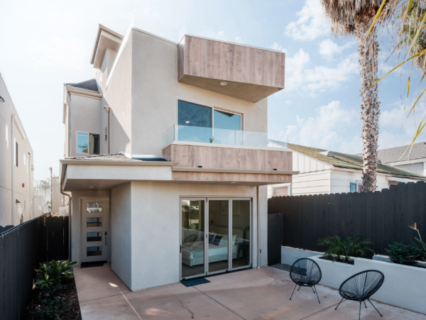 Coastal Modern Retreat with Rooftop Deck