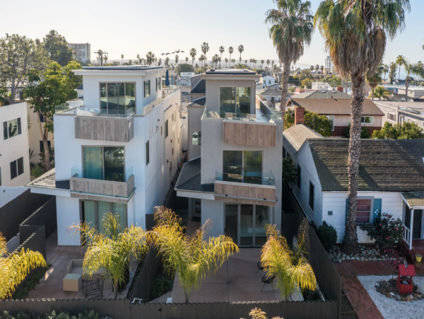 Coastal Modern Retreat with Rooftop Deck