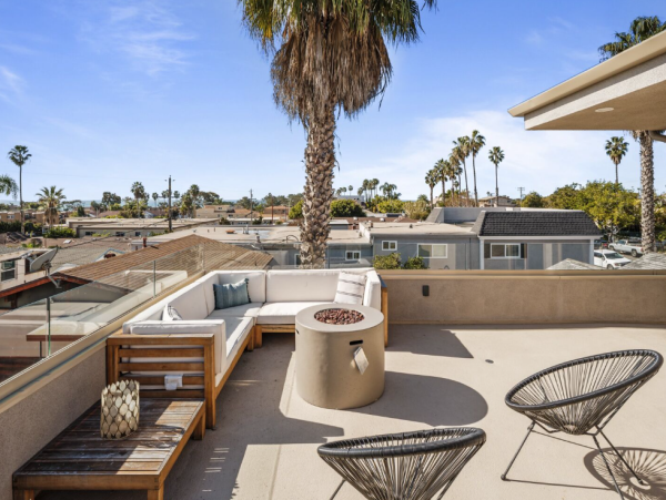 Coastal Modern Retreat with Rooftop Deck