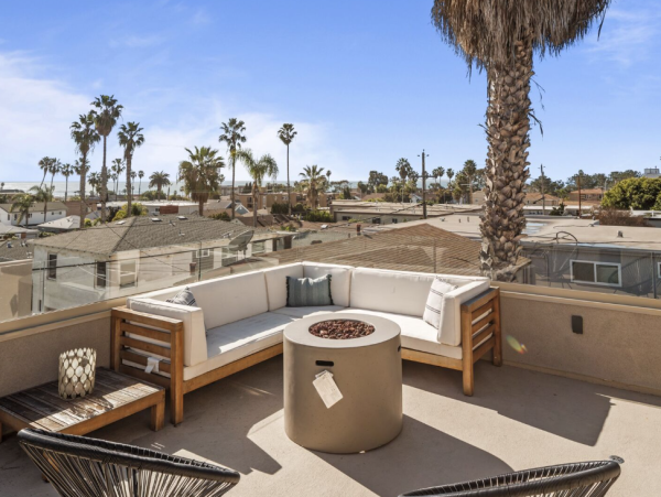 Coastal Modern Retreat with Rooftop Deck