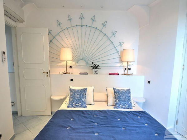 A Charming villa set into the cliff, sheer above the sea