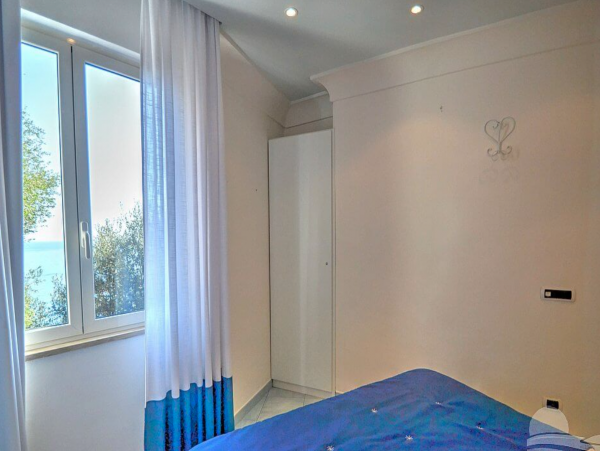 A Charming villa set into the cliff, sheer above the sea