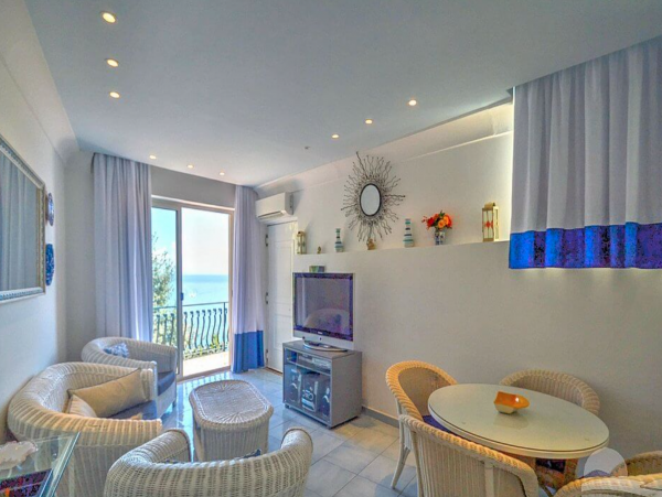 A Charming villa set into the cliff, sheer above the sea