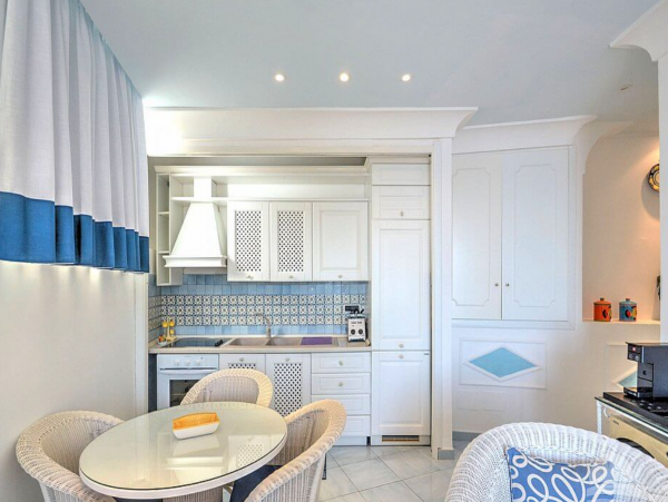 A Charming villa set into the cliff, sheer above the sea