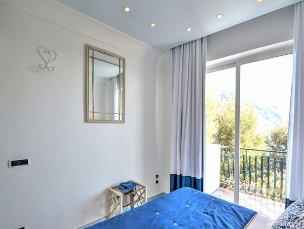 A Charming villa set into the cliff, sheer above the sea