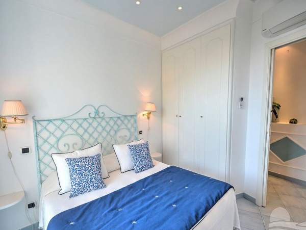 A Charming villa set into the cliff, sheer above the sea