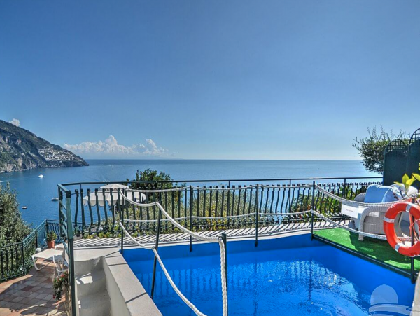 A Charming villa set into the cliff, sheer above the sea