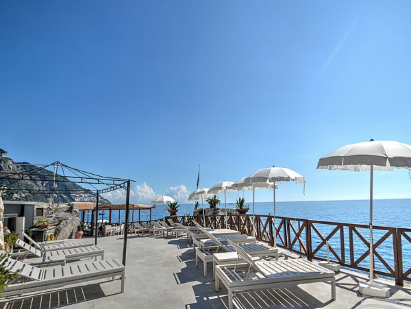 A Charming villa set into the cliff, sheer above the sea