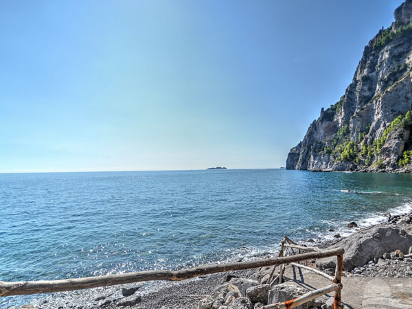 A Charming villa set into the cliff, sheer above the sea