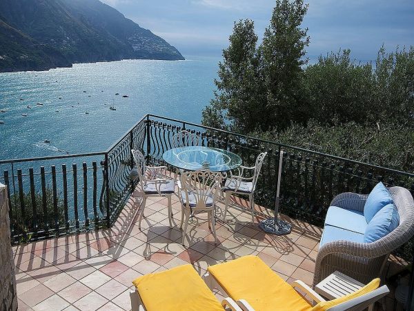 A Charming villa set into the cliff, sheer above the sea