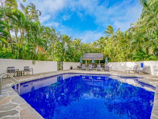 Luxury Poipu Kauai Vacation Rental  Ocean View Top-Floor Condo Near Brennecke’s Beach