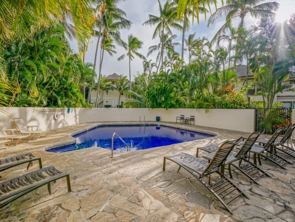 Luxury Poipu Kauai Vacation Rental  Ocean View Top-Floor Condo Near Brennecke’s Beach