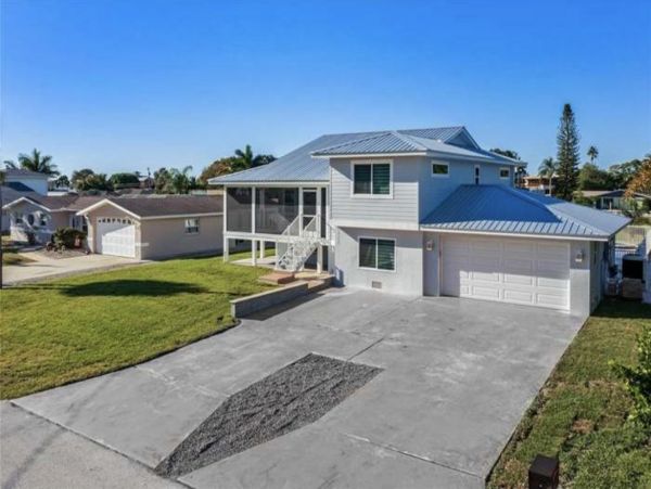 Canal-Front Vacation Home in Englewood with Pool & Hot Tub