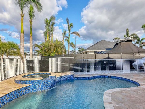 Canal-Front Vacation Home in Englewood with Pool & Hot Tub