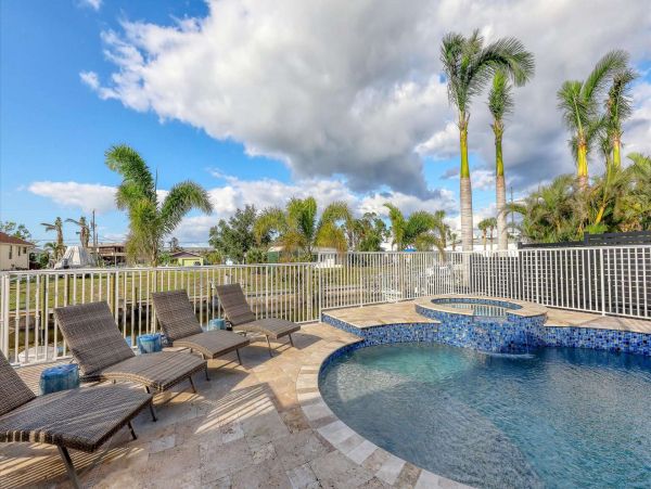 Canal-Front Vacation Home in Englewood with Pool & Hot Tub