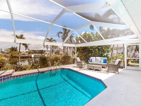 Cape Coral Canal-Front Vacation Rental 3-Bedroom Home with Private Pool & Gulf Access