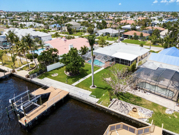 Cape Coral Four Bedroom Luxury Retreat with Caged Pool