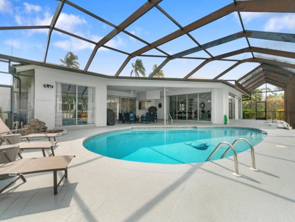Canal-Front Vacation Home in Marco Island with Pool & Tennis Court