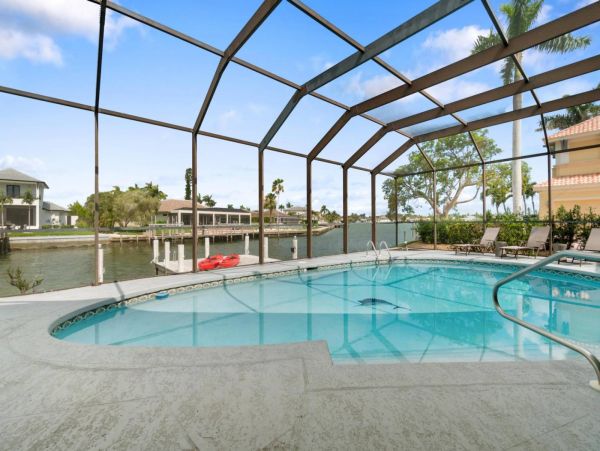 Canal-Front Vacation Home in Marco Island with Pool & Tennis Court