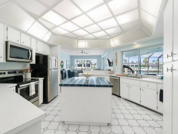 Canal-Front Vacation Home in Marco Island with Pool & Tennis Court