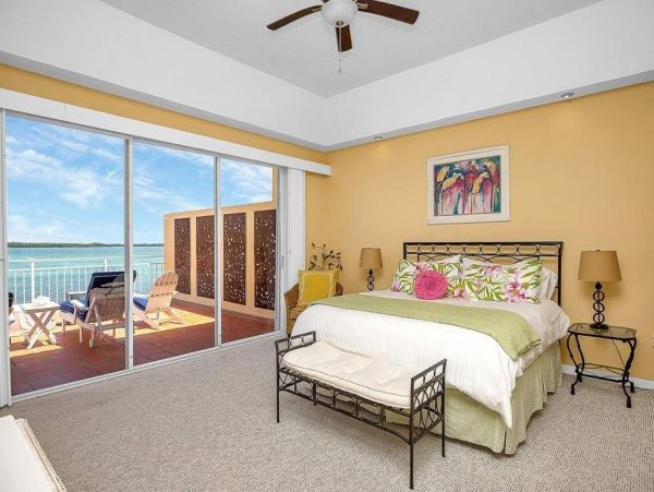Waterfront 3 Bedroom Vacation Condo with Pool & Dock