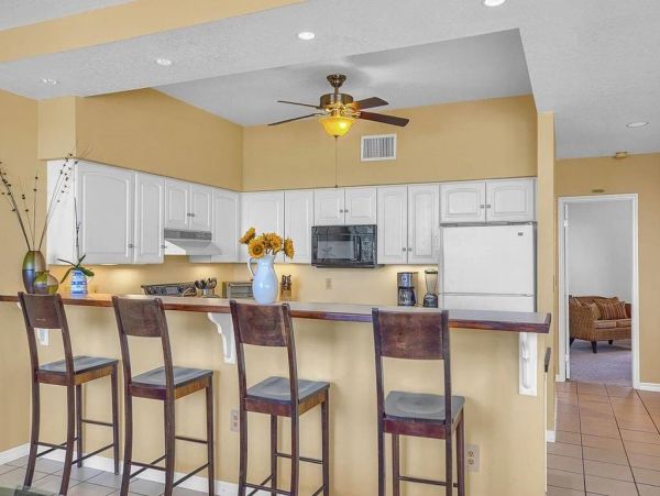 Waterfront 3 Bedroom Vacation Condo with Pool & Dock