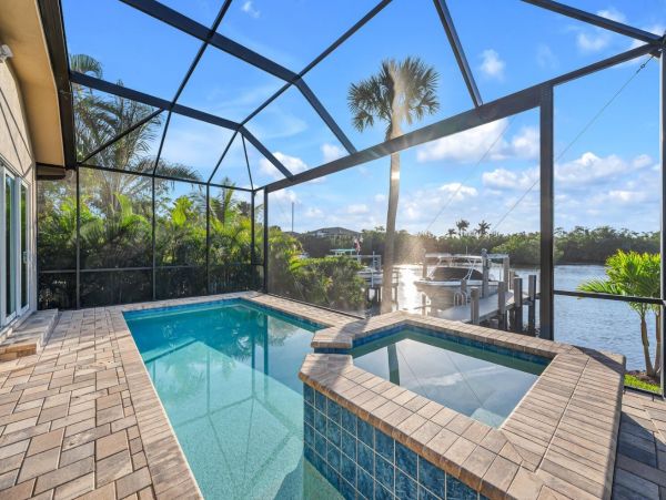 Canal-Front Gorgeous Vacation Home in Naples with Pool