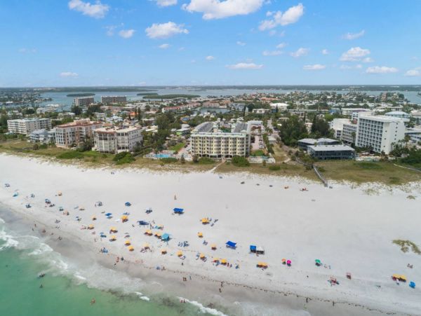 BeachFront Two Bedroom Vacation Condo w/ Heated Resort Pool