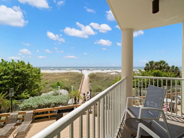 BeachFront Two Bedroom Vacation Condo w/ Heated Resort Pool