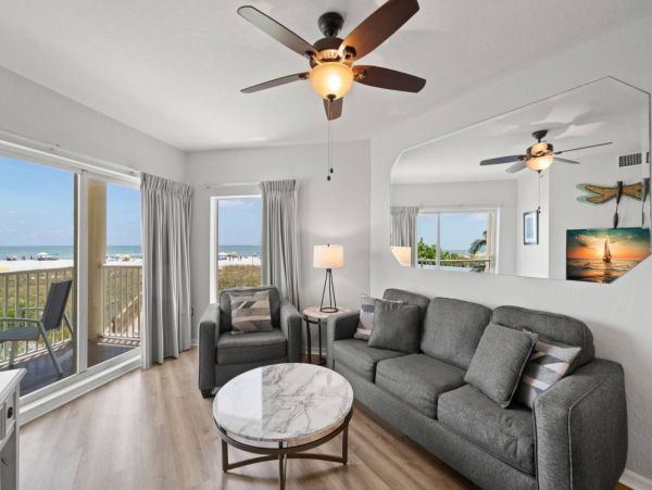 BeachFront Two Bedroom Vacation Condo w/ Heated Resort Pool