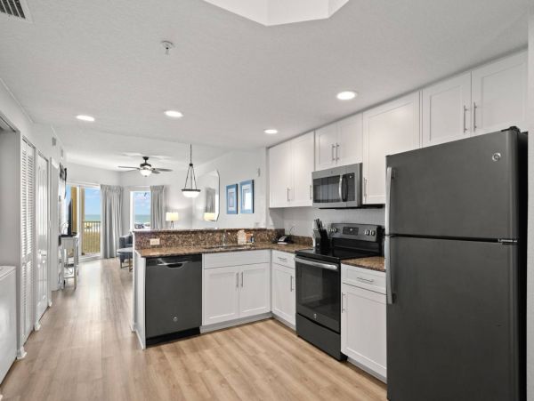 BeachFront Two Bedroom Vacation Condo w/ Heated Resort Pool