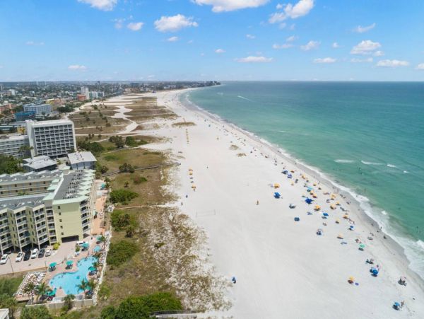 BeachFront Two Bedroom Vacation Condo w/ Heated Resort Pool