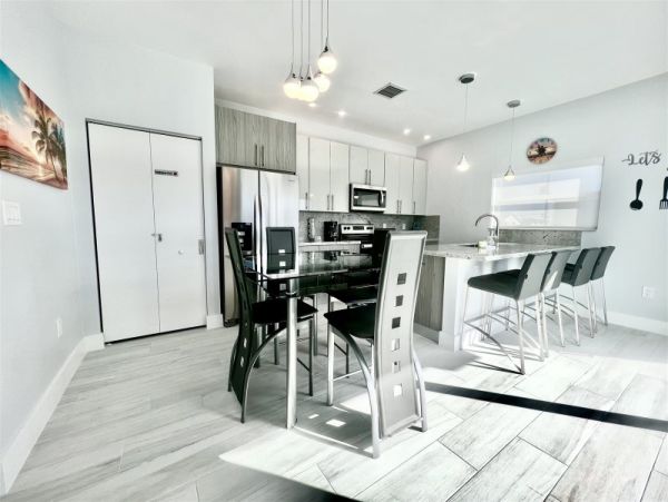 Waterfront 4 Bedroom Vacation Rental with Dock & Pool