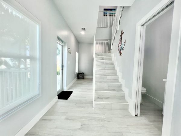Waterfront 4 Bedroom Vacation Rental with Dock & Pool
