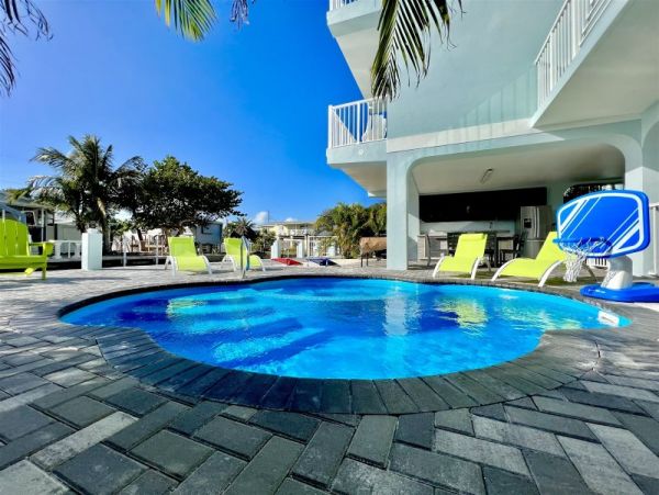Waterfront 4 Bedroom Vacation Rental with Dock & Pool