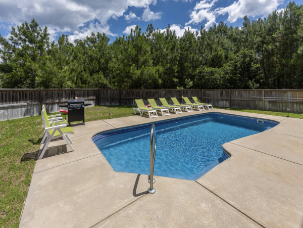 Outer Banks Luxury Vacation Rental  7-Bedroom Corolla Beach House with Pool & Game Room