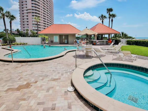 Clearwater condo on beach with pool and tennis