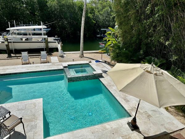 Only One Block to Beach Three Bedroom Vacation Home with Pool
