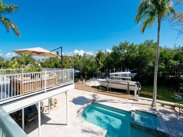 Only One Block to Beach Three Bedroom Vacation Home with Pool
